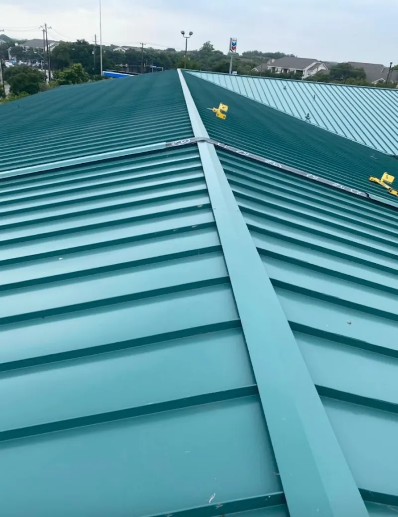 Green commercial metal roof ridge and valley for Metal Roof Repair in Davis